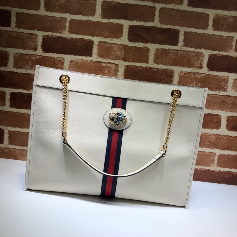 G*u*i shopping bags
